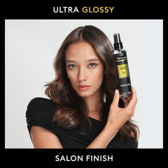 TRESemmé Lamellar Gloss Shine Spray finishing spray on dry hair for extra shine.