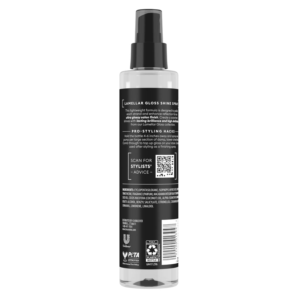TRESemmé Lamellar Gloss Shine Spray nozzle applying on damp hair for sleek finish.