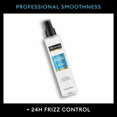 Detangling with a wide-tooth comb after applying TRESemmé Pro Pure Leave-In Conditioner.