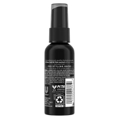 TRESemmé Travel Hairspray anti-humidity spritz demonstrates frizz resistance in humid conditions.