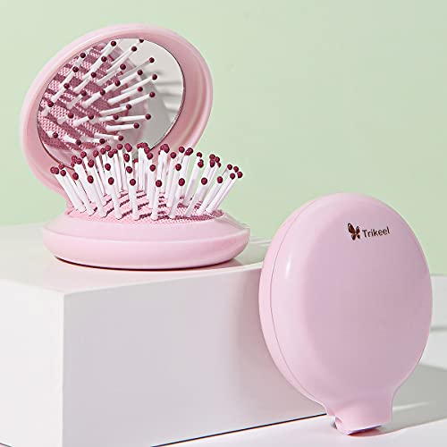 Close-up of Trikeel bristles massaging scalp during use