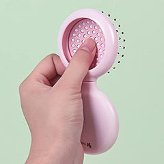 Trikeel pink folding brush ready for purse or backpack