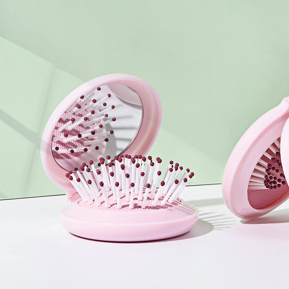 Trikeel travel brush with mirror close-up for checks