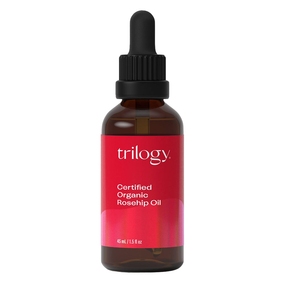 Trilogy Rosehip Oil bottle showing pure cold-pressed formula for all skin types.