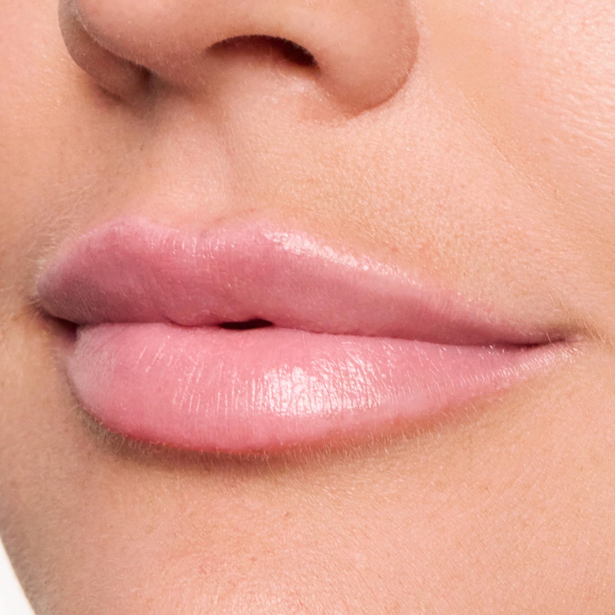 Trish McEvoy Easy Lip Color Dolled Up deep shade applied with brush for precise color.