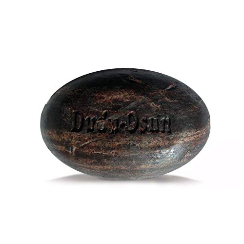 Tropical Naturals Dudu Osun soap texture close-up emphasizing pure ingredients for gentle cleansing.