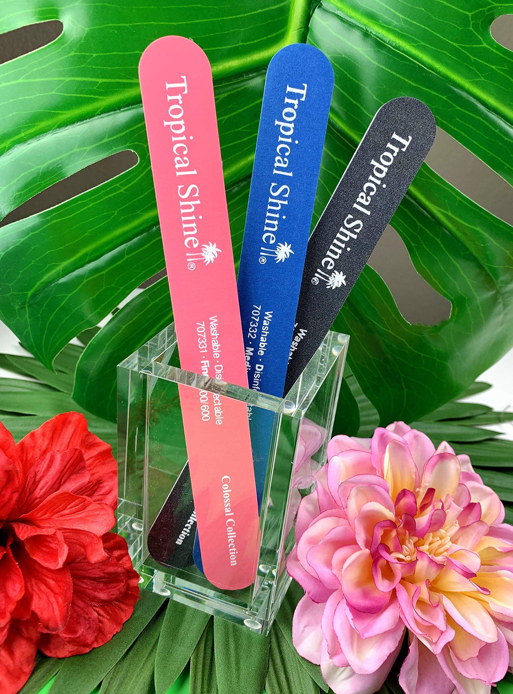 Tropical Shine nail files in use at home, smoothing natural nails.
