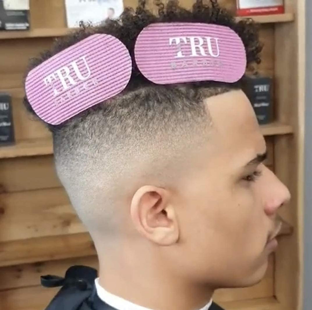 TRU BARBER hair holder provides steady hold during masks and makeup.
