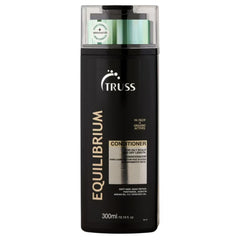 TRUSS Equilibrium bottle front shows balanced hydration for oily scalp and dry ends.