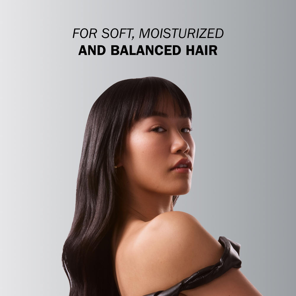 TRUSS Equilibrium hair shine closeup highlights soft, frizz-free strands.
