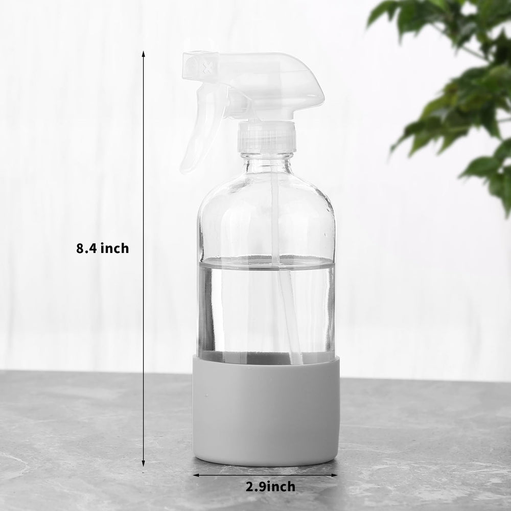 TTTred glass spray bottle with grey silicone sleeve for secure handling in wet conditions.