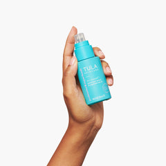 TULA A+ Renewal serum swirl on skin shows a refreshing, hydrating texture.