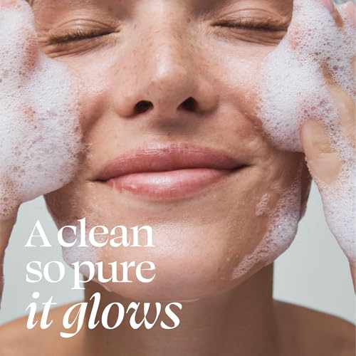 Cleanser on bathroom shelf suggests an easy at-home spa moment.