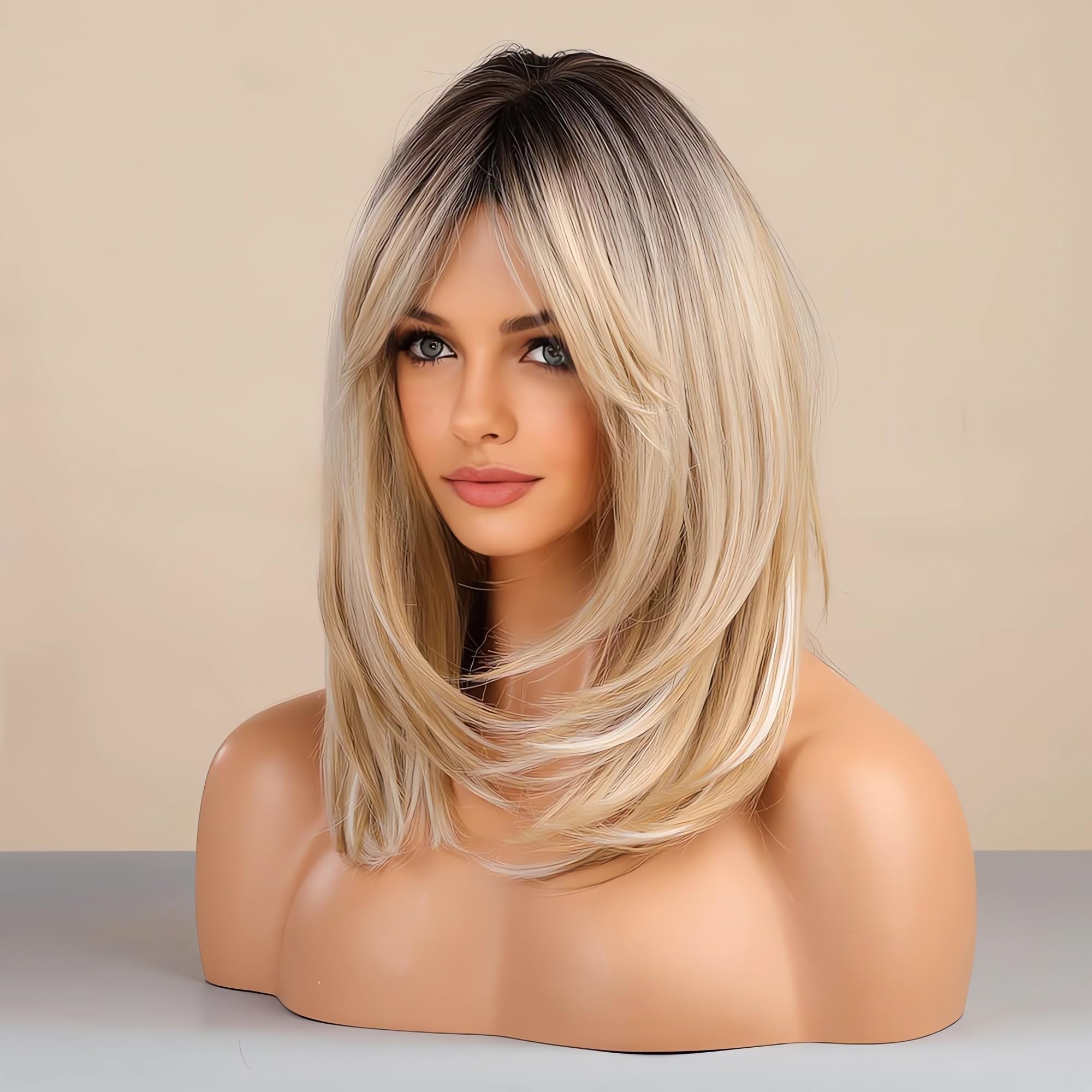 Tumhorn blonde wig with dark roots shown for natural, effortless transition.