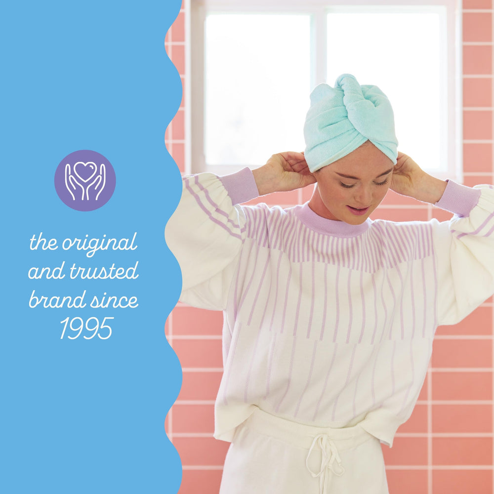 Turbie Twist worn-on-head demonstrates secure, hands-free secure styling during routines.