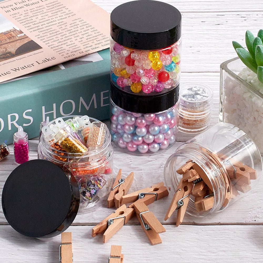 TUZAZO transparent cosmetic storage jars for lotions, serums and samples.