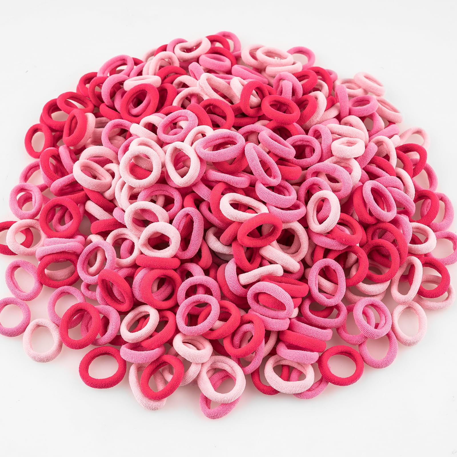 TVINLIK baby hair ties in mixed pink for gentle, snag-free ponytails.