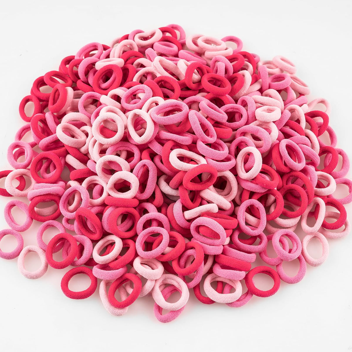 TVINLIK baby hair ties in mixed pink for gentle, snag-free ponytails.