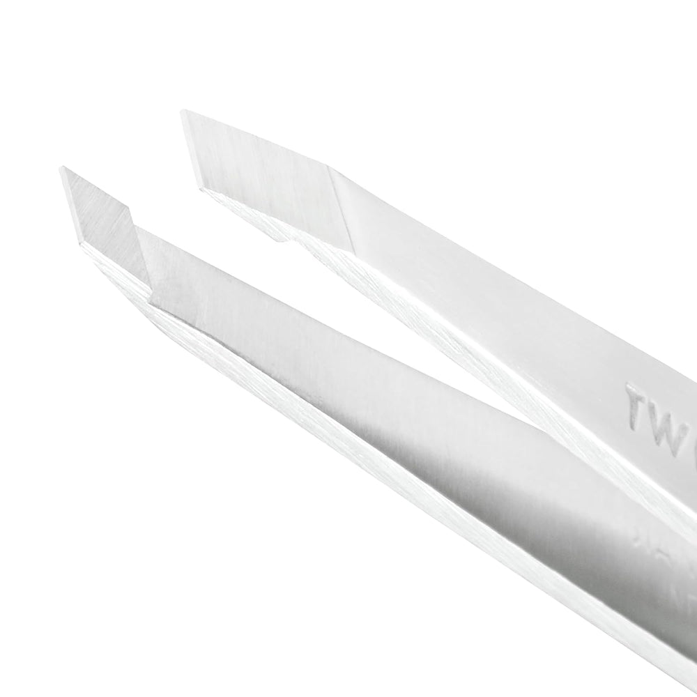 Tweezerman brow tweezer in use for clean, accurate grooming