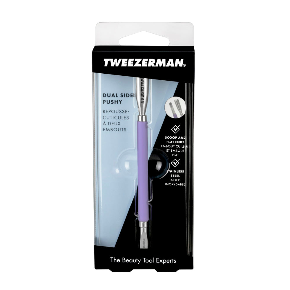 Tweezerman Dual Sided Pushy in use shows ergonomic grip.