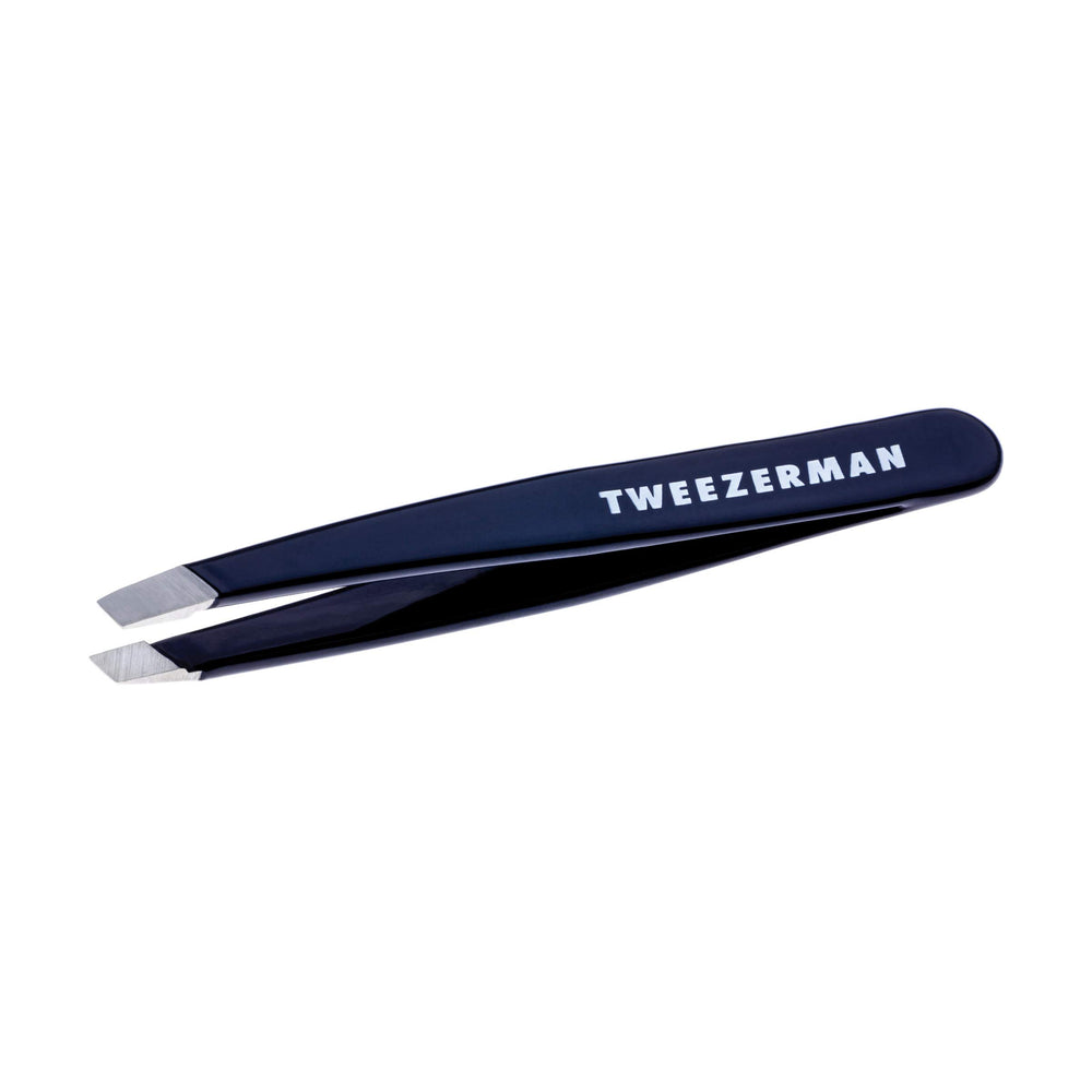 Tweezerman Evening Blue Mini Slant Tweezer closeup highlighting precise brow shaping