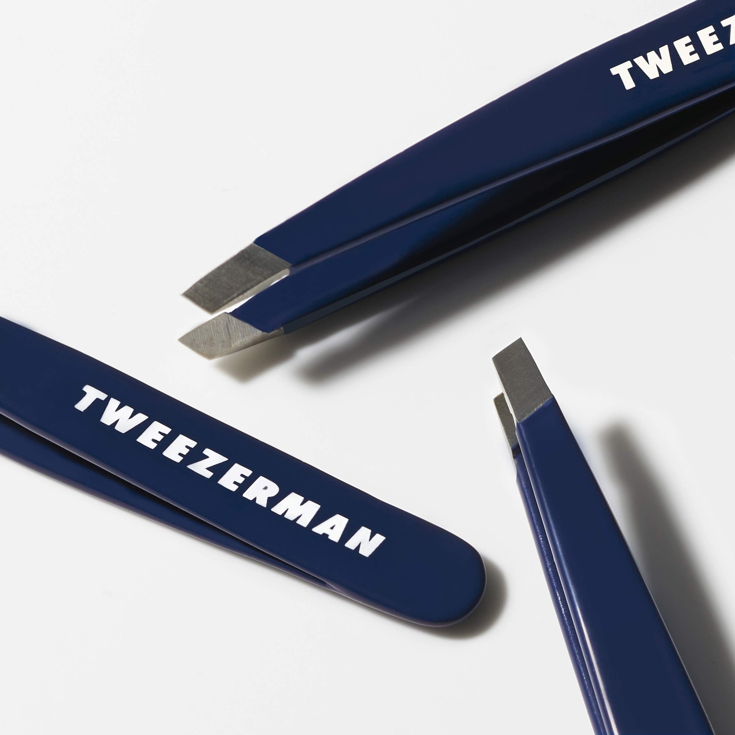 Tweezerman Evening Blue Mini Slant Tweezer removes hair from the root with steady grip