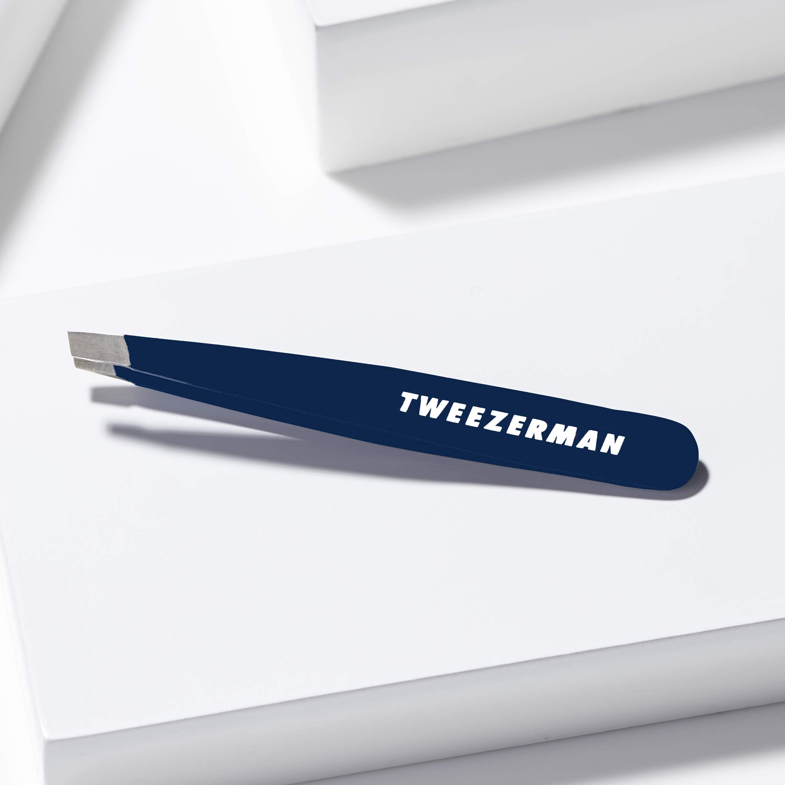 Tweezerman Evening Blue Mini Slant Tweezer ready for travel touch-ups