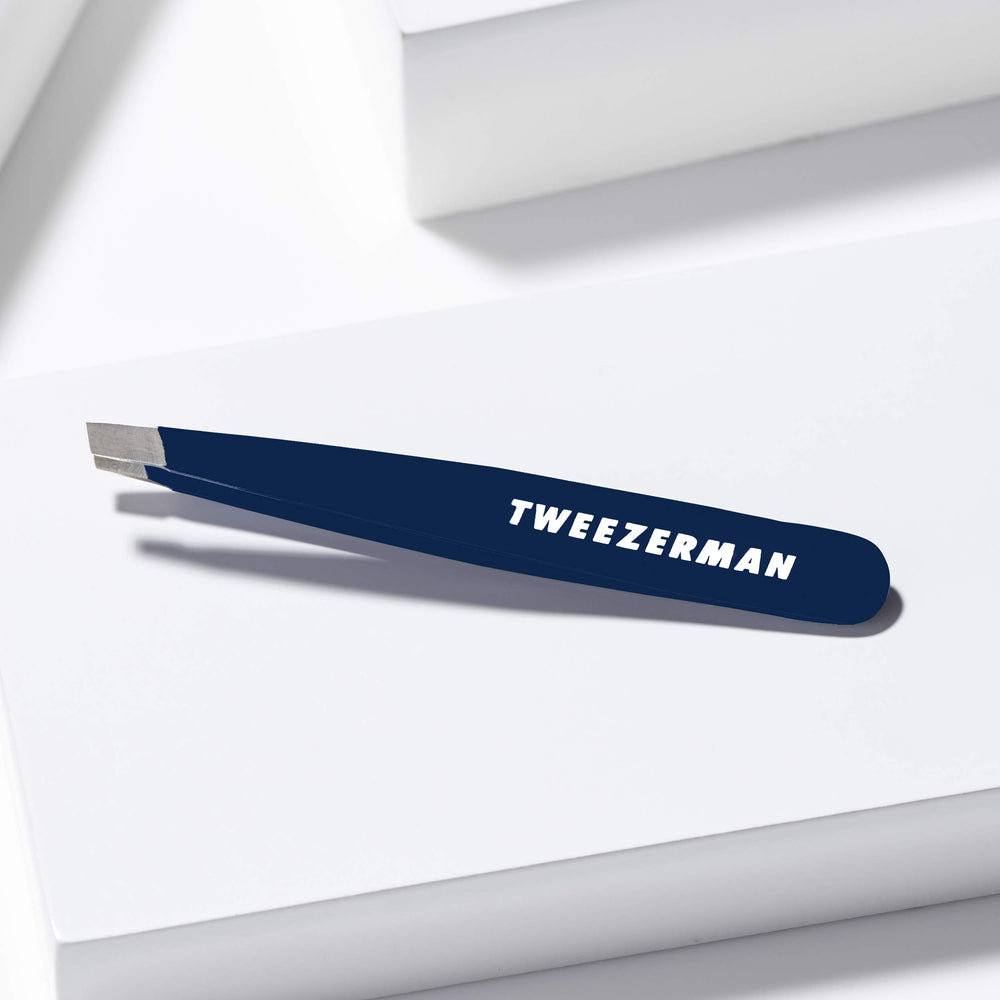 Tweezerman Evening Blue Mini Slant Tweezer ready for travel touch-ups