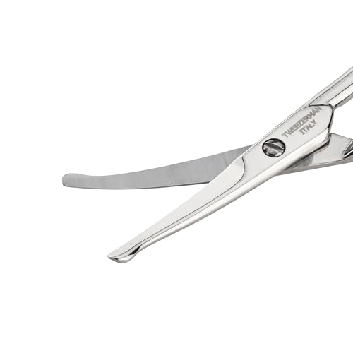 Tweezerman facial hair scissors handle close-up shows ergonomic grip for comfortable trimming.