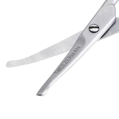 Ergonomic handles on Tweezerman G.E.A.R. scissors provide comfortable control.