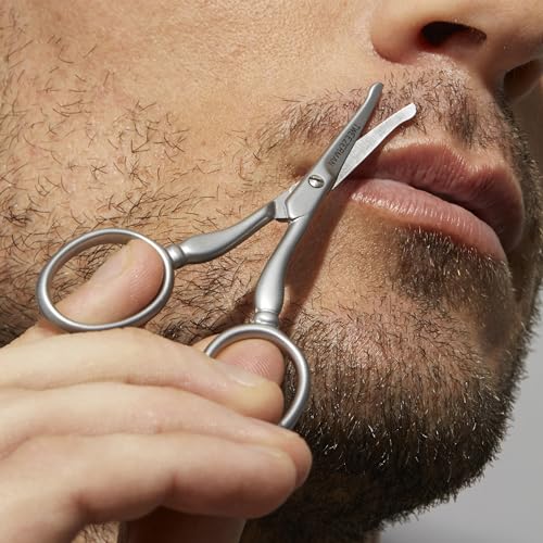 Rounded blade tip helps prevent nicks while trimming visible hair.