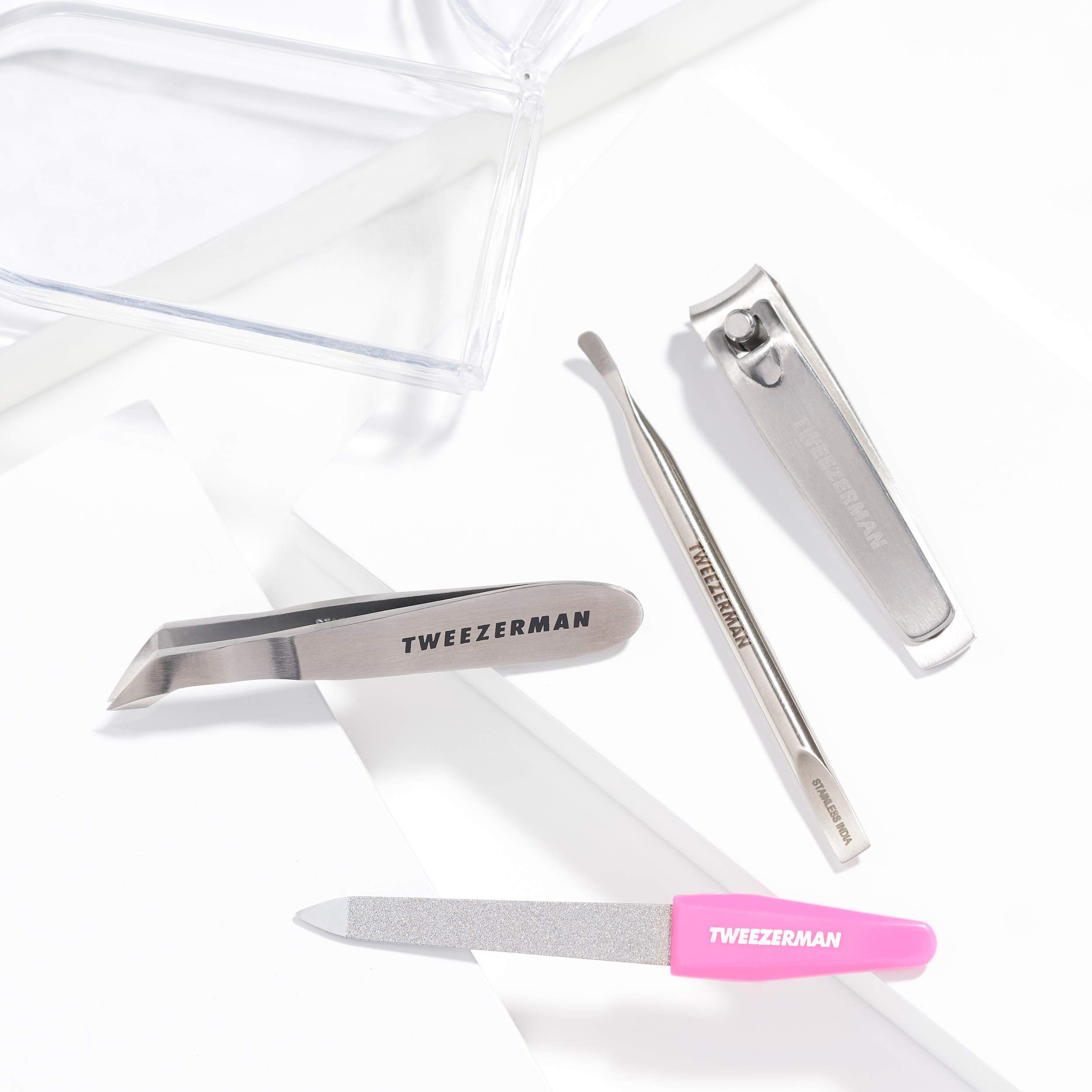 Tweezerman Mini Nail Rescue Kit curved-edge-clipper trims nails precisely.