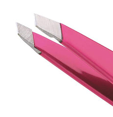 Tweezerman mini point tip closeup demonstrates fine hair removal accuracy.