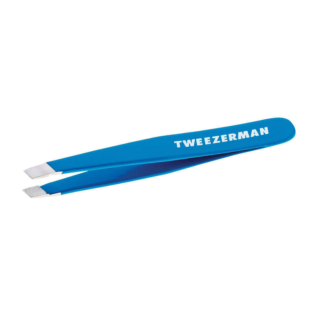 Tweezerman Mini Slant Bahama Blue close-up of angled tips for precise brow hair removal.