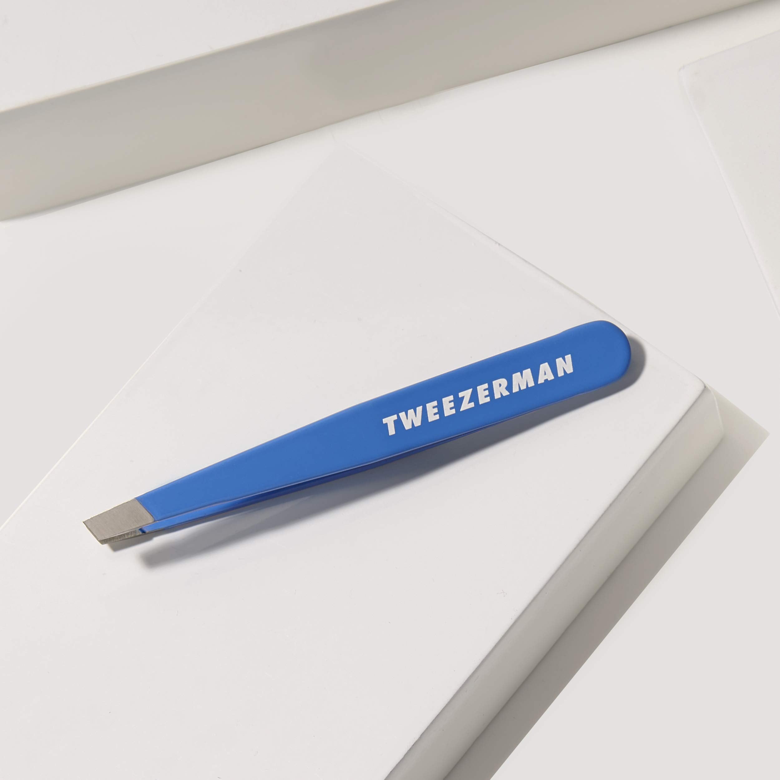 Tweezerman Mini Slant Bahama Blue compact travel design ideal for on-the-go grooming.