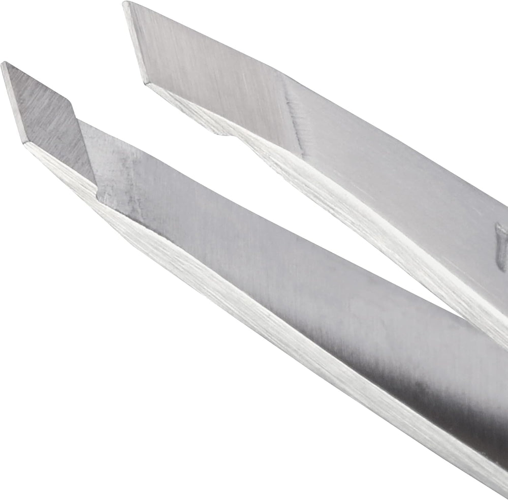 Tweezerman Mini Slant Tweezer angled tips enable precise brow shaping.