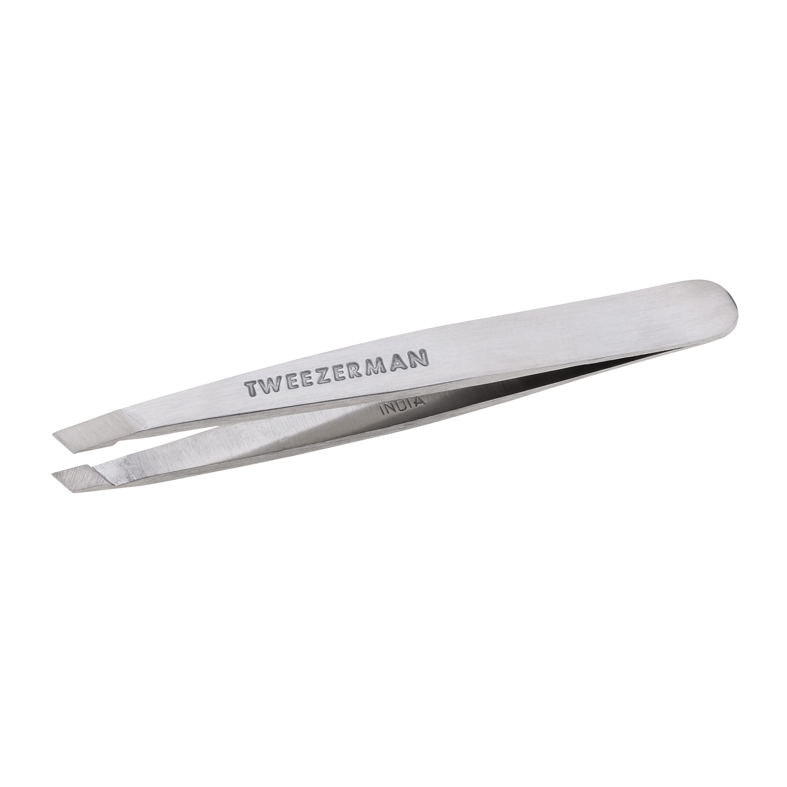 Tweezerman Mini Slant Tweezer travel-ready design for on-the-go grooming.