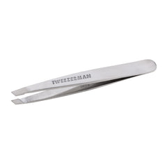 Tweezerman Mini Slant Tweezer travel-ready design for on-the-go grooming.