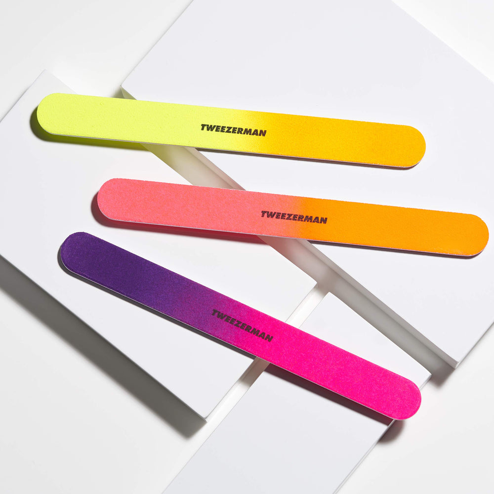 Tweezerman Neon Hot Nail Files in use for quick nail shaping at home.
