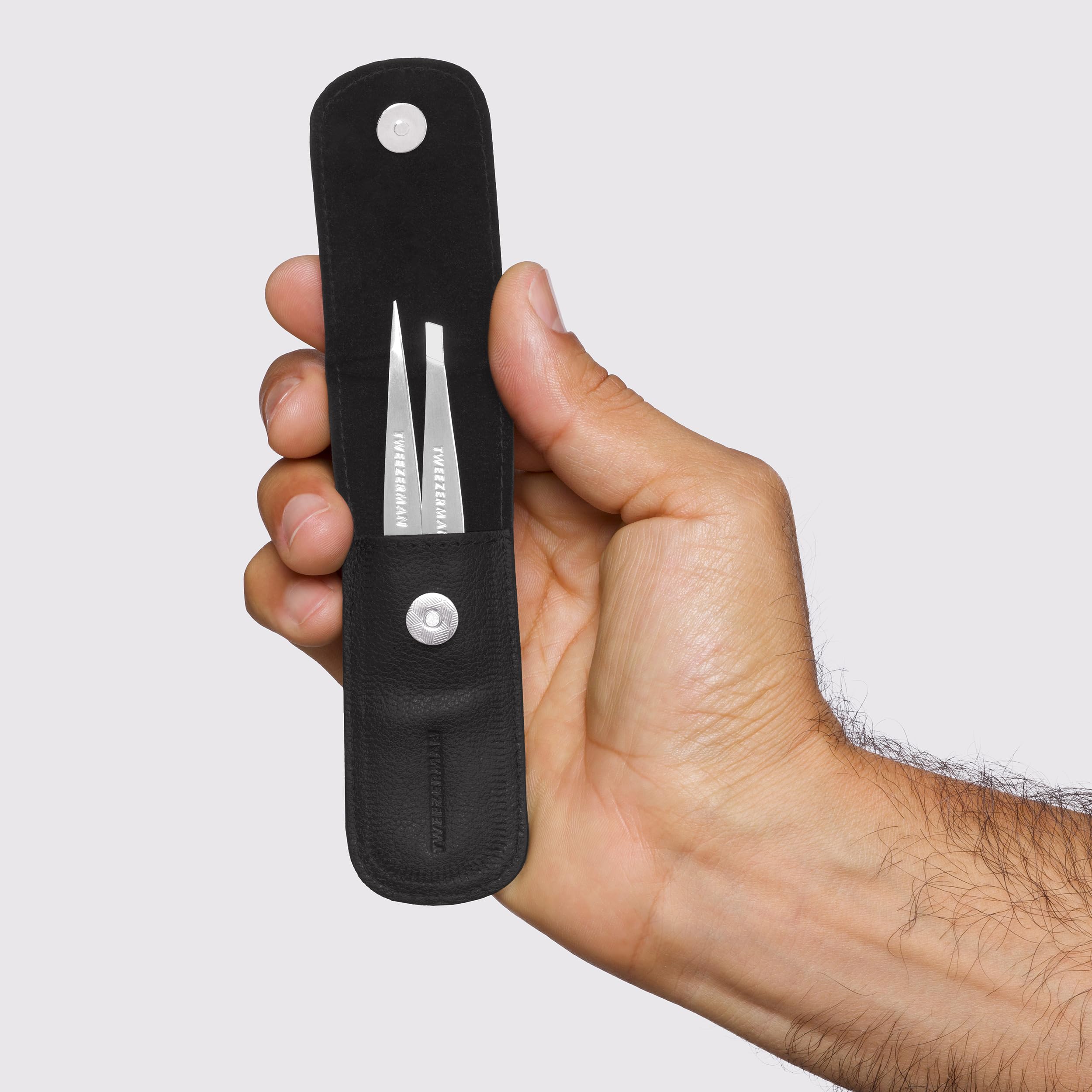 Tweezerman Point Tweezer removes fine hairs with precision.