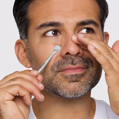 Close-up of Tweezerman Pore Prep Tool removing dirt from pores for clearer skin.
