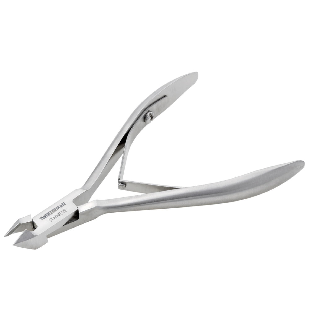 Tweezerman Rockhard cuticle nipper blade close-up shows sharp edges for precise trims.