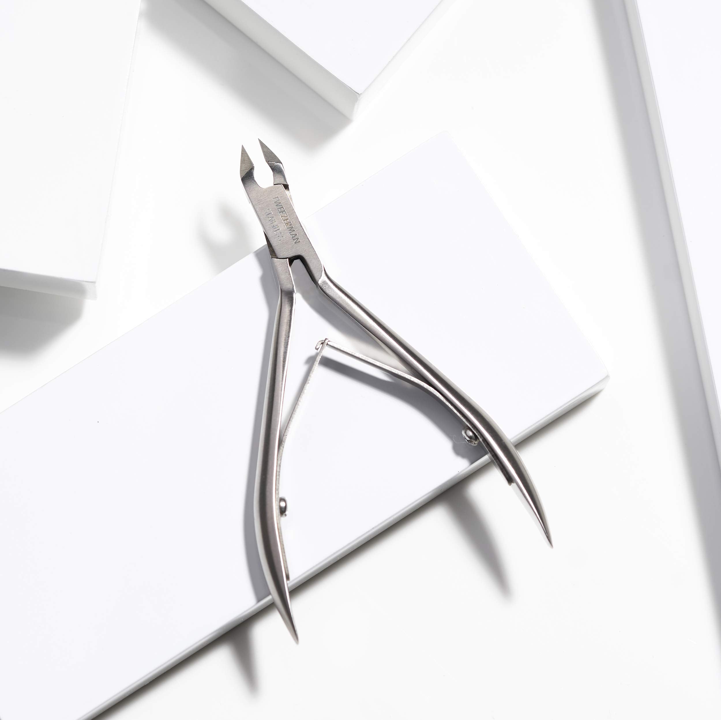 Tweezerman Rockhard with cuticle pushy for gentle prep before trimming.