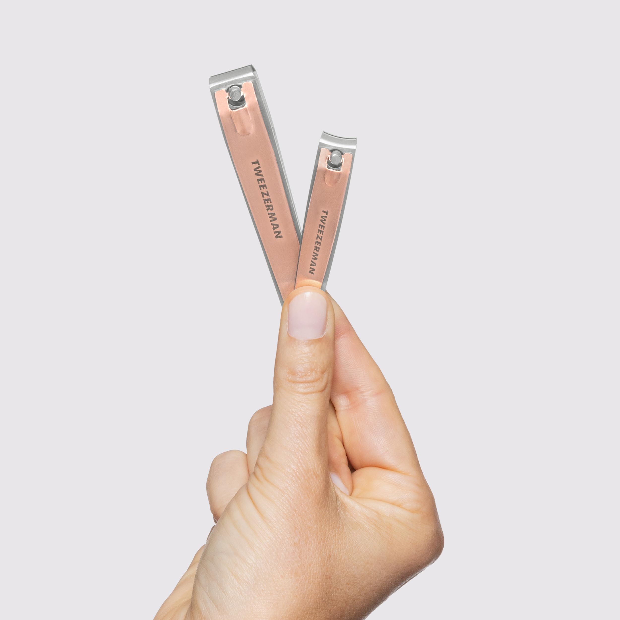 Close-up of easy-clean blades on Tweezerman Rose Gold clipper.