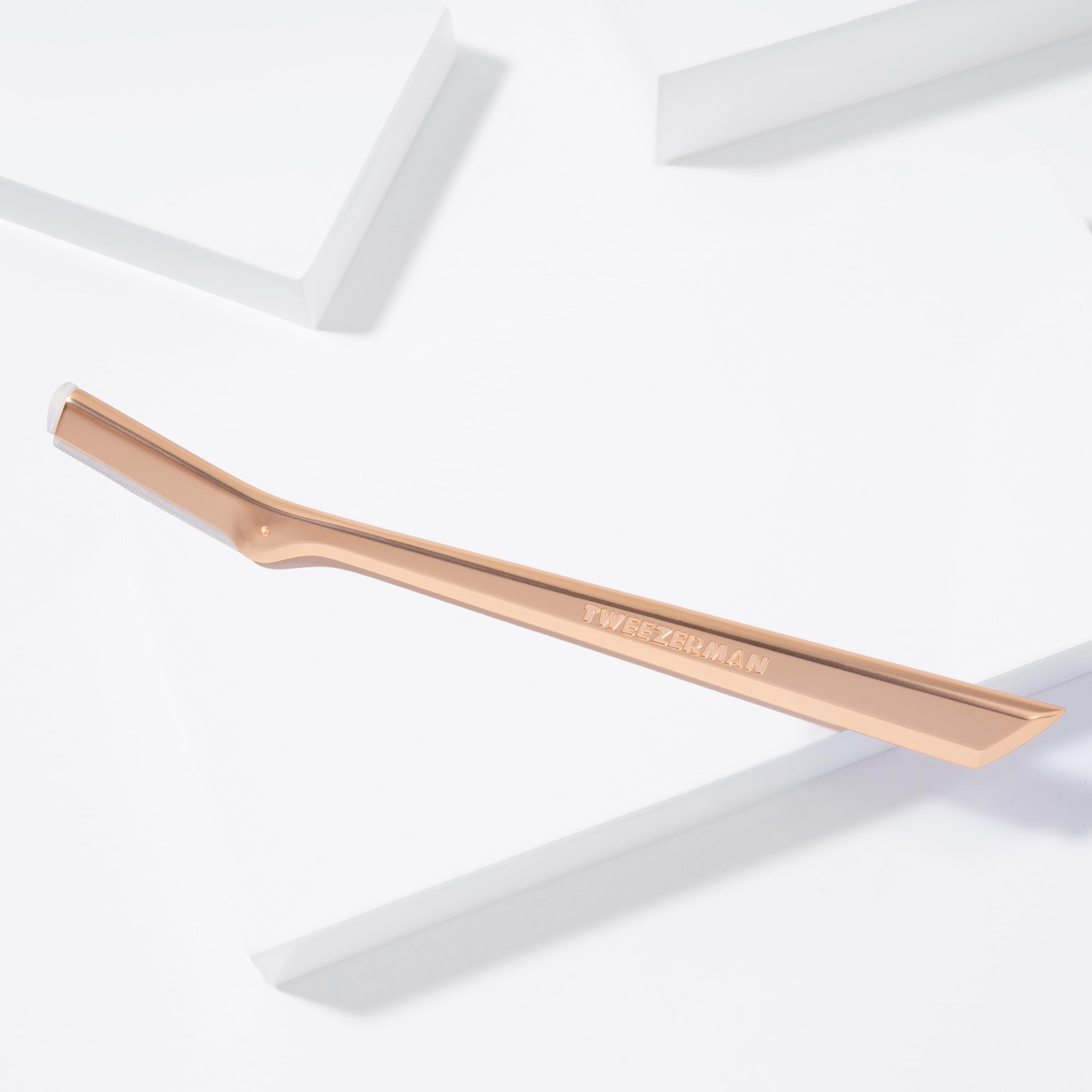 Tweezerman Rose Gold Facial Razor stainless steel construction detail