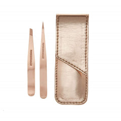 Tweezerman rose gold petite point tweezers with aligned tips for precise removal