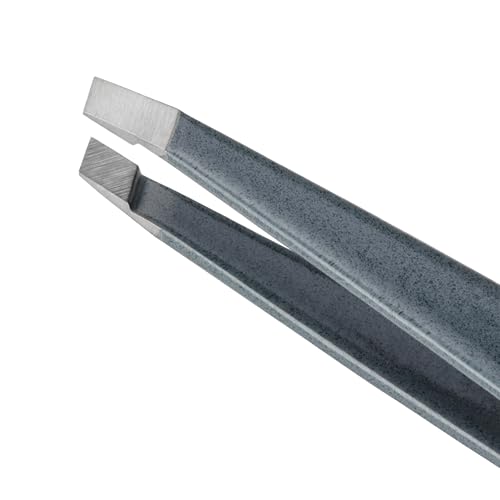 Close-up of Tweezerman slant tweezer precision tips for accurate hair removal.