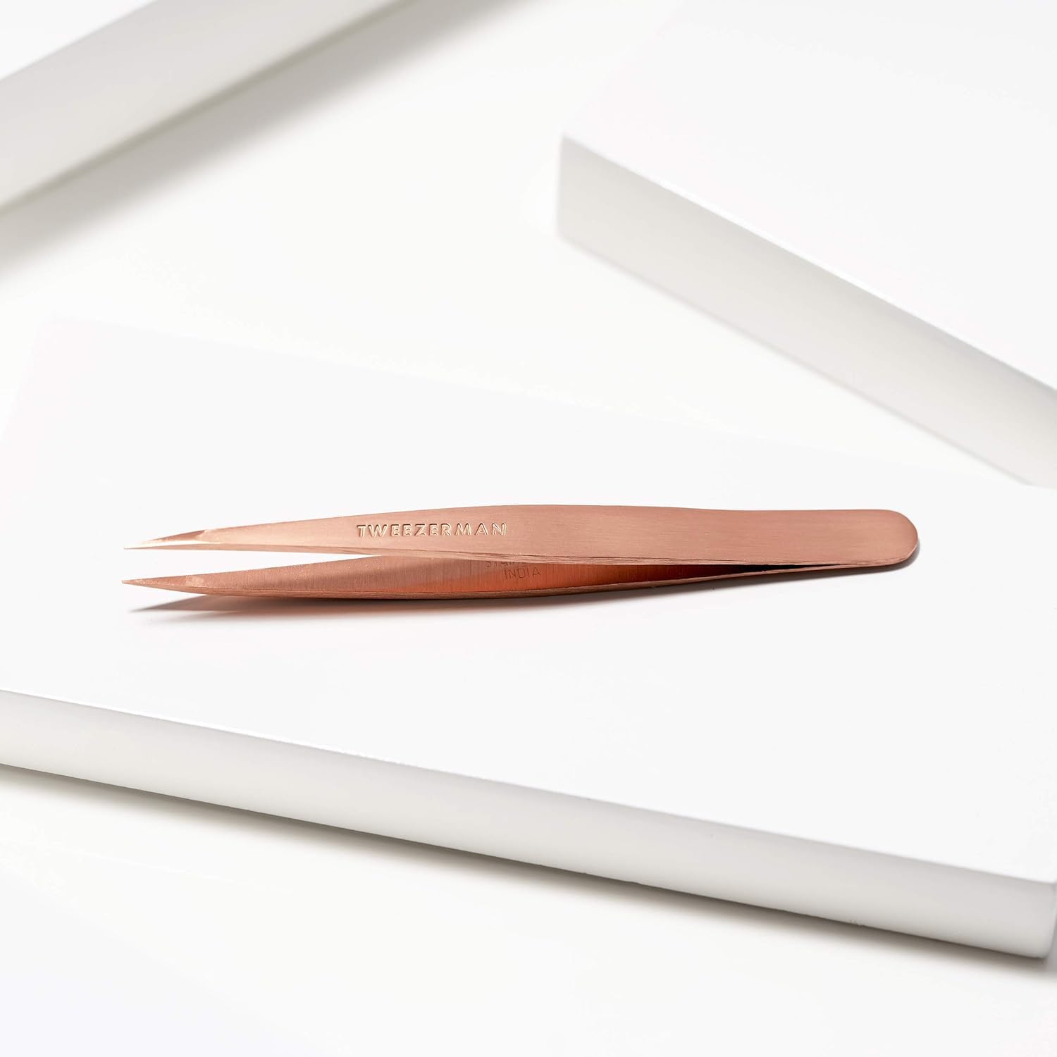Tweezerman 25-degree angle tip enabling easy hair extraction