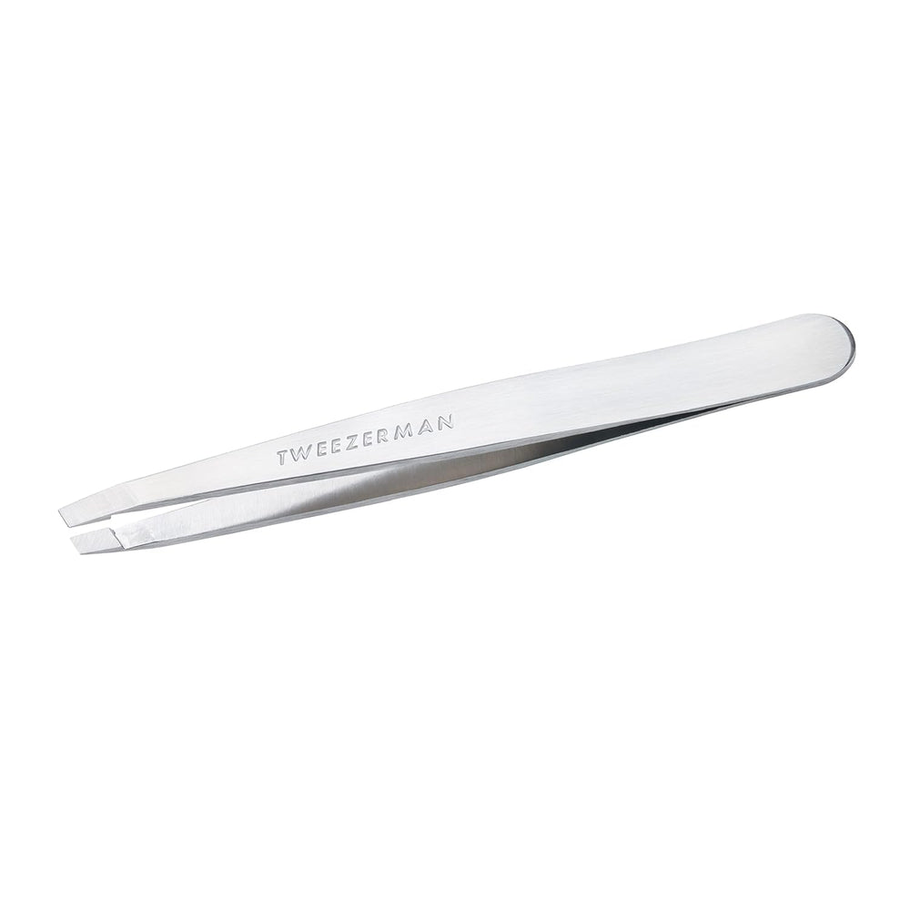 Tweezerman stainless steel slant tweezer close-up with precision tips for hair removal