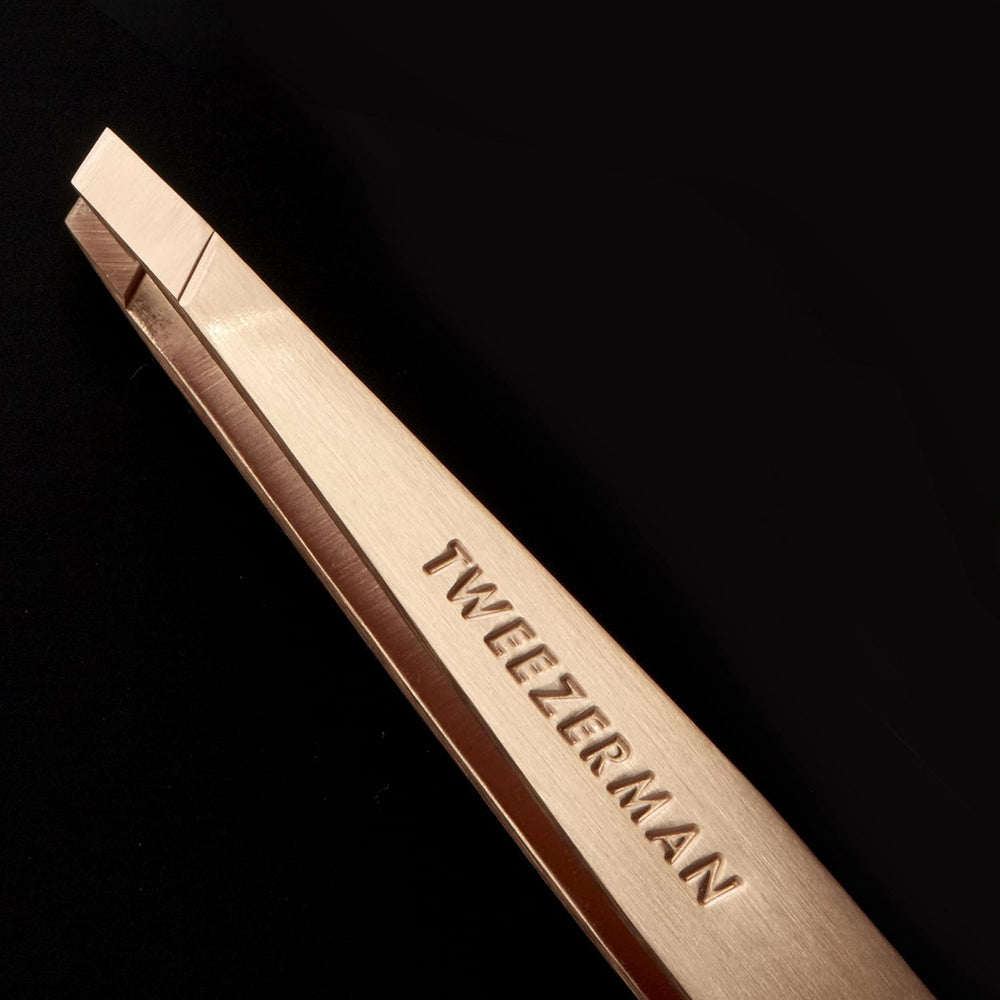 Durable Tweezerman stainless steel slant tweezer with rose gold finish